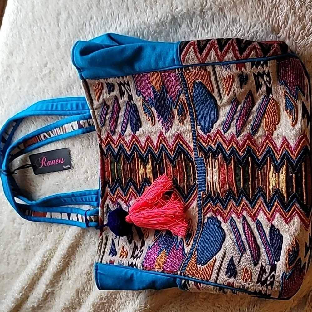 Ranees  of Miami bag fully beaded on one side